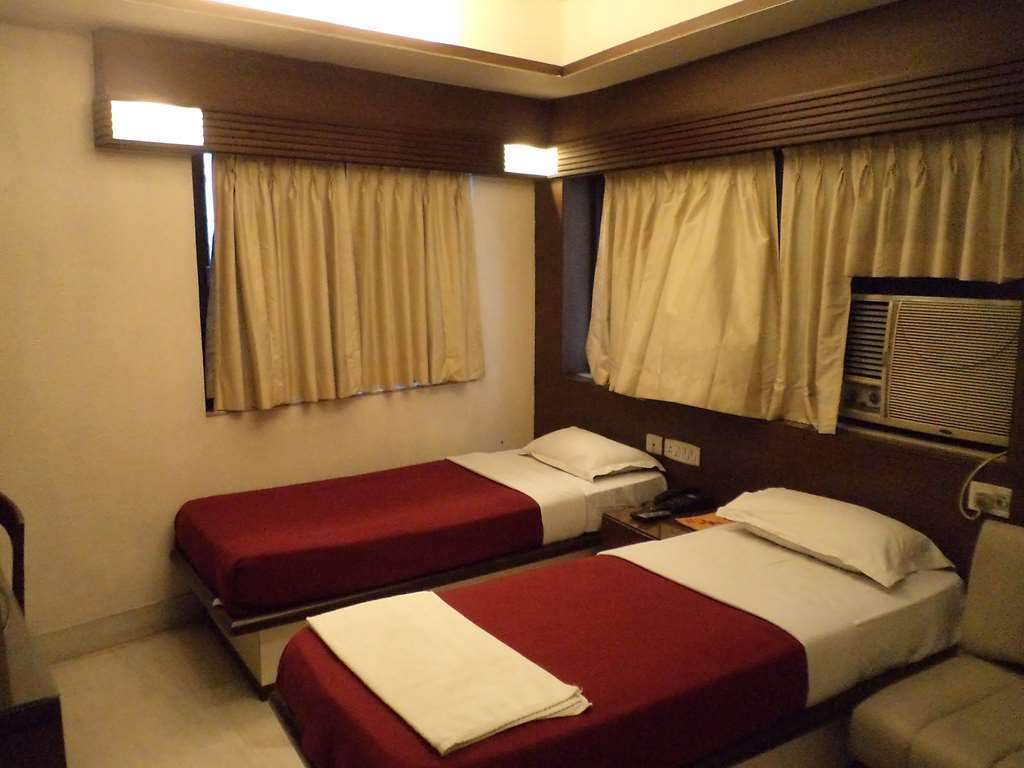 Hotel Aston Kalkutta Zimmer foto