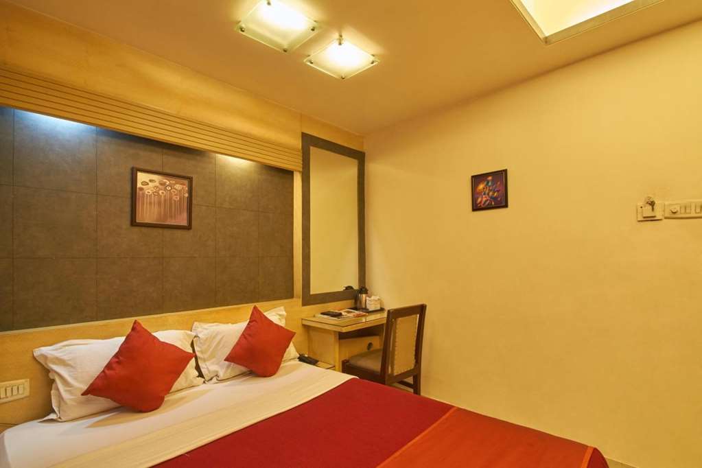 Hotel Aston Kalkutta Zimmer foto